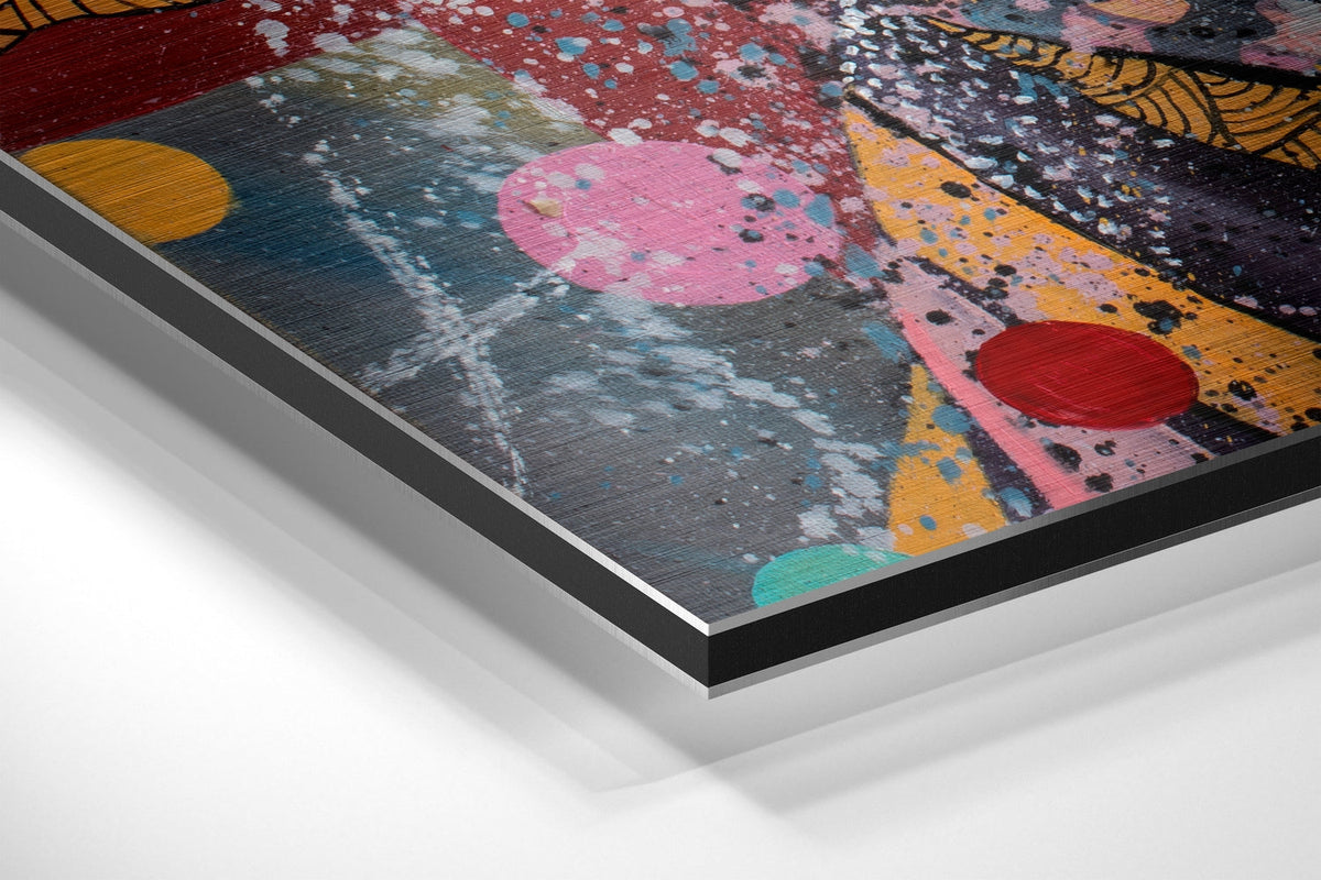 Hushing woman pop art brushed aluminum panel corner close-up showing the brushed metal grain
