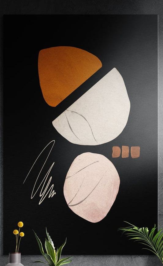 Boho organic shapes on black abstract brushed aluminum wall art on a dark wall above a vase and plants