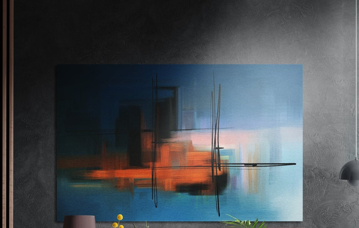 Orange and blue blurred abstract brushed aluminum wall art on a dark textured wall