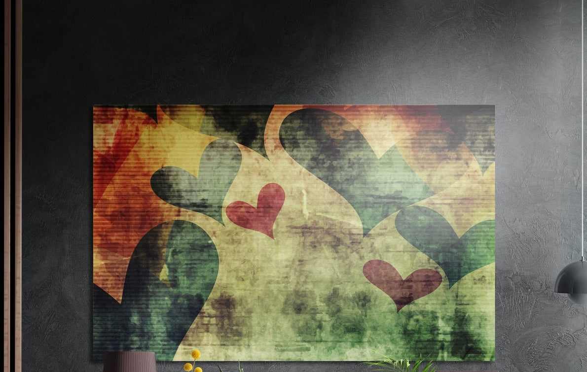 Copper, green and red grunge hearts on a weathered cream ground, brushed aluminum wall art on a dark wall