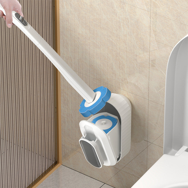 Replaceable toilet brush head snaps on wand