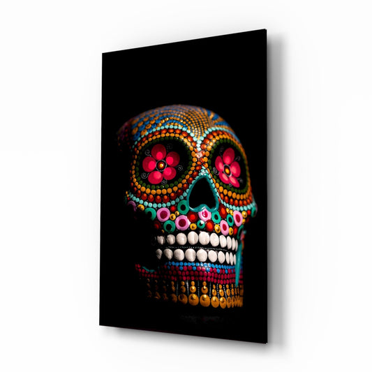 Rainbow dotted sugar skull glass wall art on a white background, tall piece shown at an angle