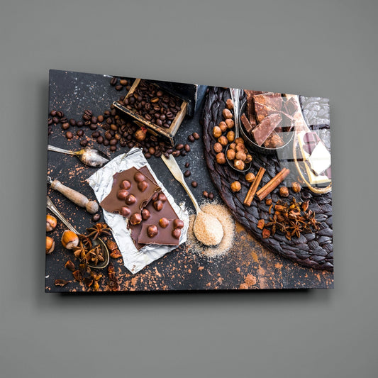 Chocolate and hazelnuts glass wall art angled on a plain gray background