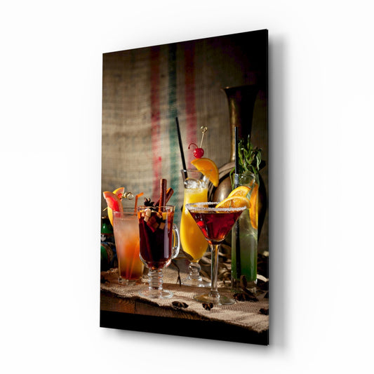 Row of spiced winter cocktails with citrus and star anise on a burlap board, printed on glass and shown on white