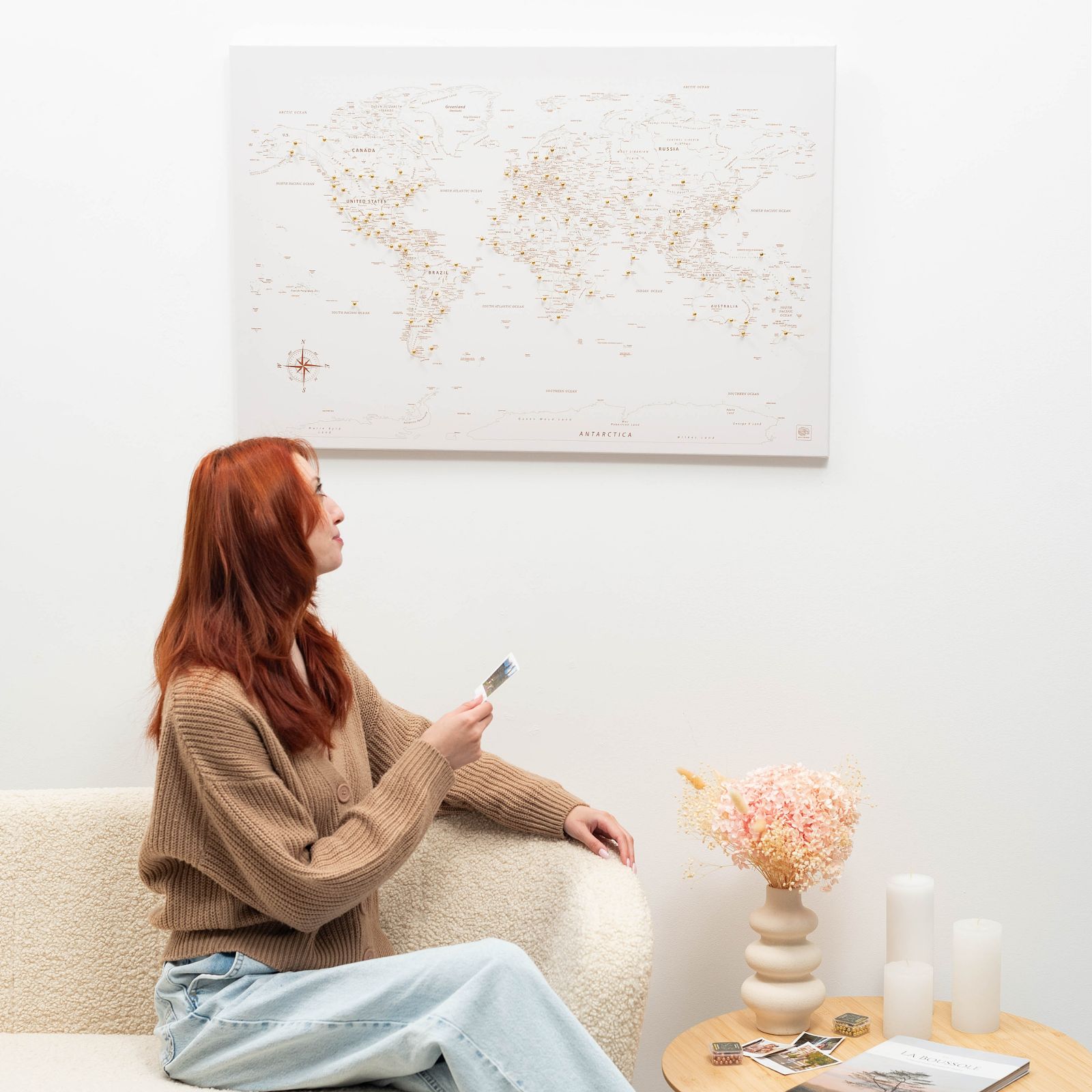 Beige world map canvas wall art in a pine wood frame