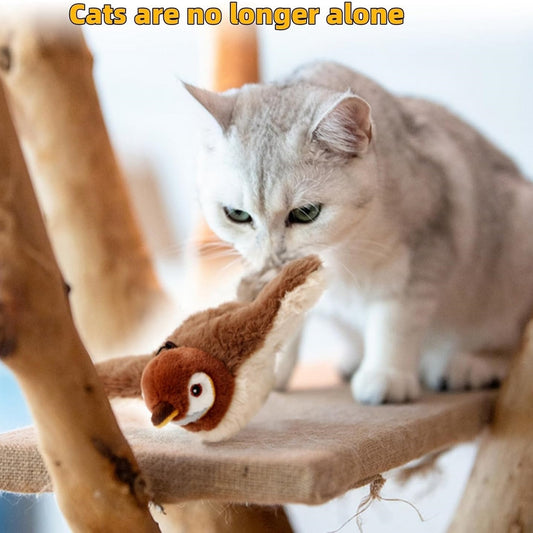 cat playing with interactive chirping bird toy
