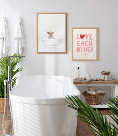 Highland Cow Solo Bathtub Framed Glass Wall Art