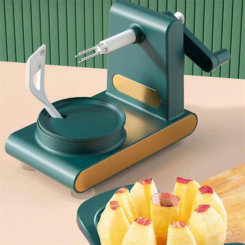 dark green kitchen peeler machine shown slicing apples on countertop