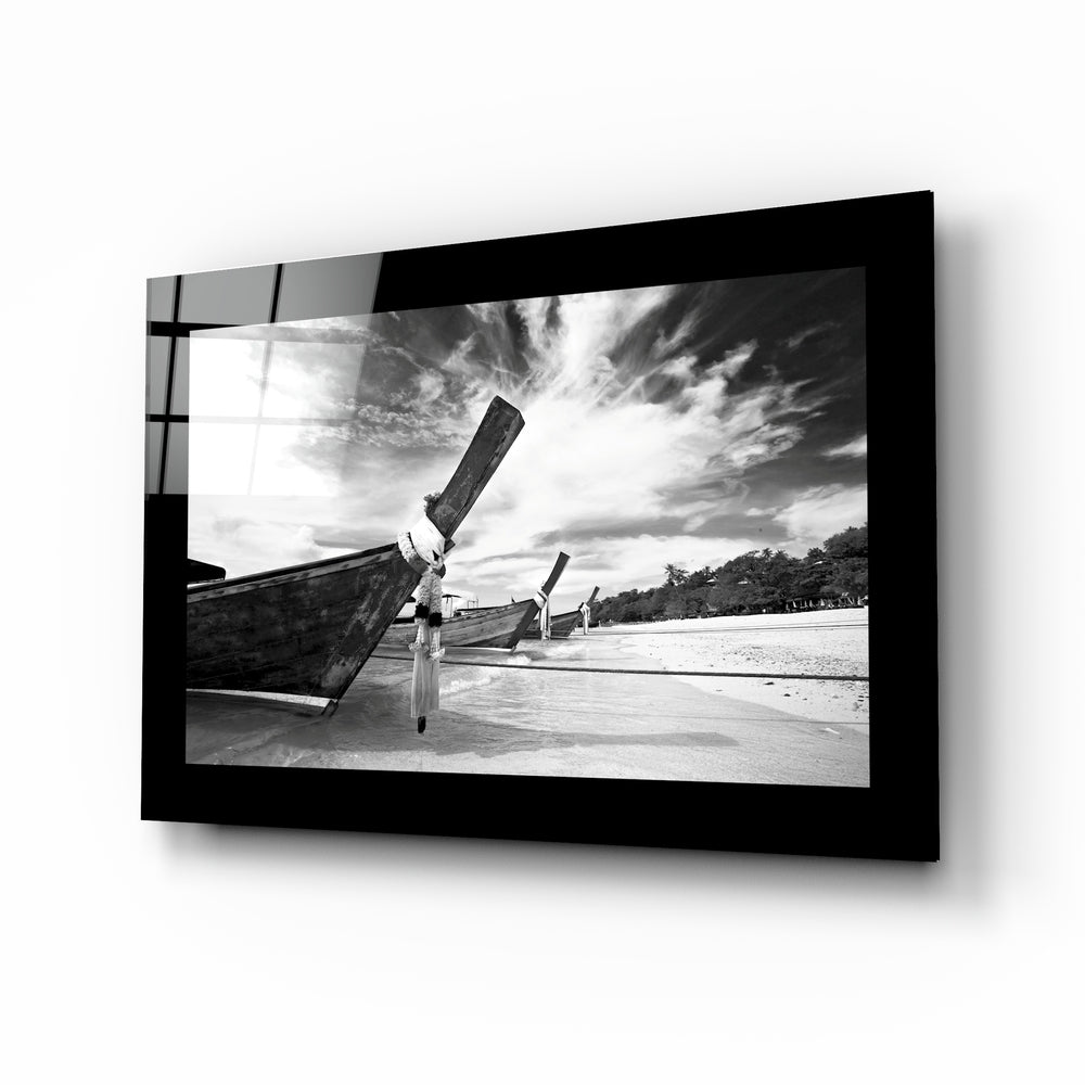 Longtail Boats glass wall art in black and white on a tropical beach