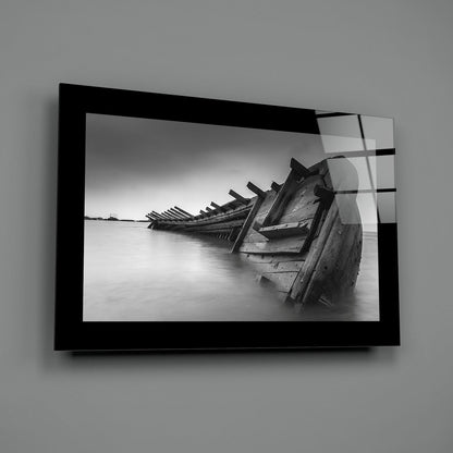 Black and white shipwreck glass wall art shown at an angle against a gray wall