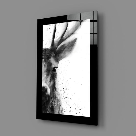 Ink wash stag glass wall art on a gray wall, the antlered head dissolving into white space