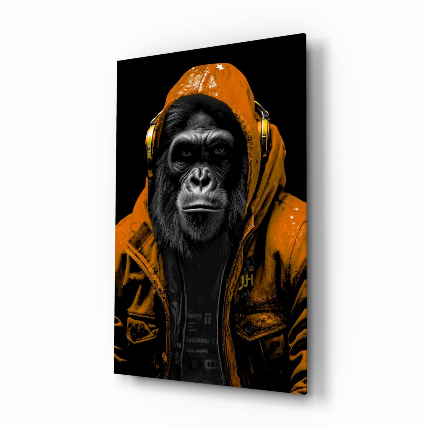 Tangerine Ape glass wall art hanging in a media room