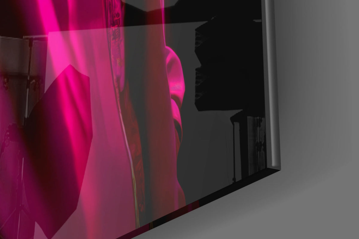 Close-up of the glossy glass edge on the rhino piece showing the magenta jacket