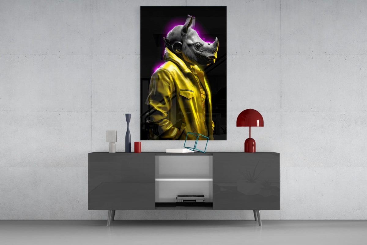 Rhino in yellow jacket glass wall art above a gray sideboard with a red table lamp