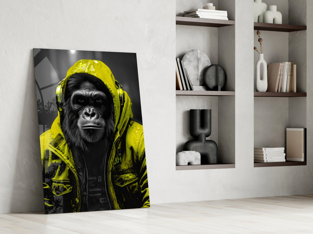 Yellow rain hood gorilla glass wall art leaning against a wall next to shelves of vases and books