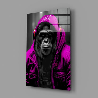 Pink rain hood gorilla glass wall art on a gray wall with a soft window reflection