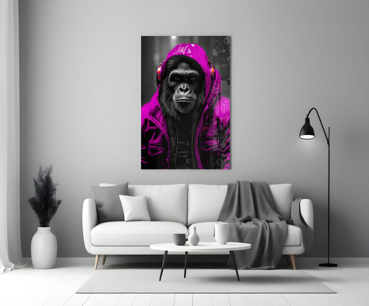 Pink rain hood gorilla glass wall art above a white sofa with a coffee table and floor lamp
