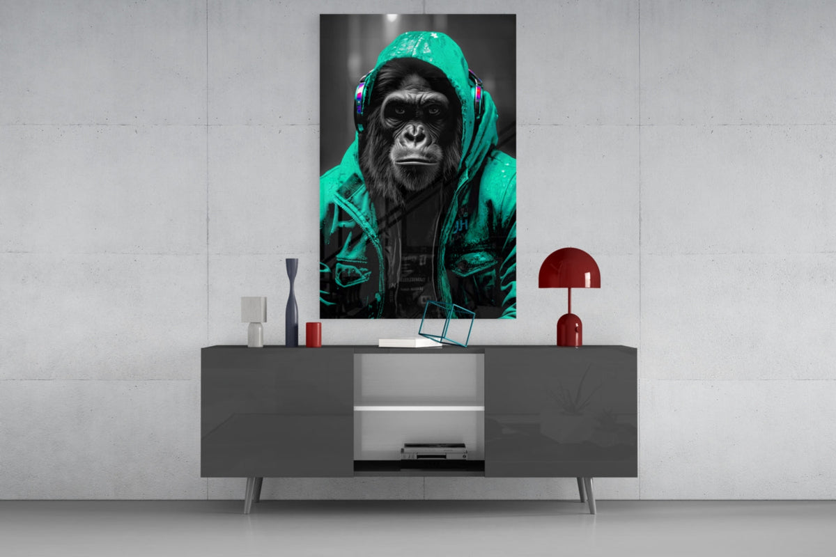 Turquoise rain hood gorilla glass wall art on a concrete wall above a gray sideboard with small decor