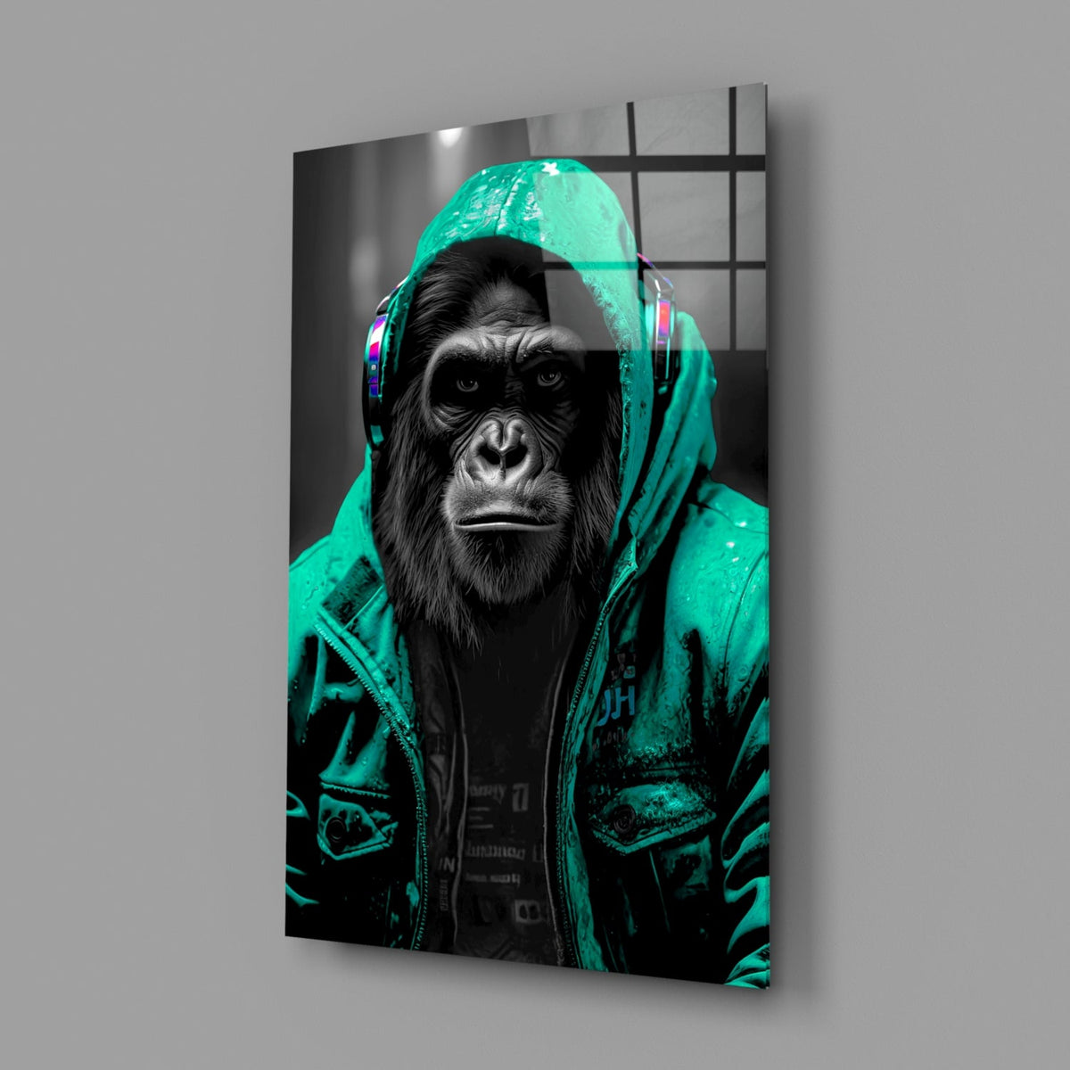 Turquoise rain hood gorilla glass wall art on a gray wall with a soft window reflection