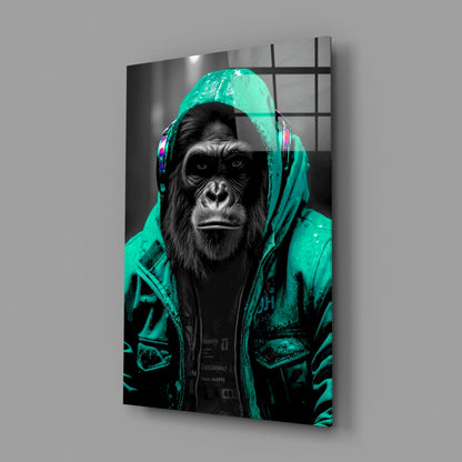 Turquoise rain hood gorilla glass wall art on a gray wall with a soft window reflection