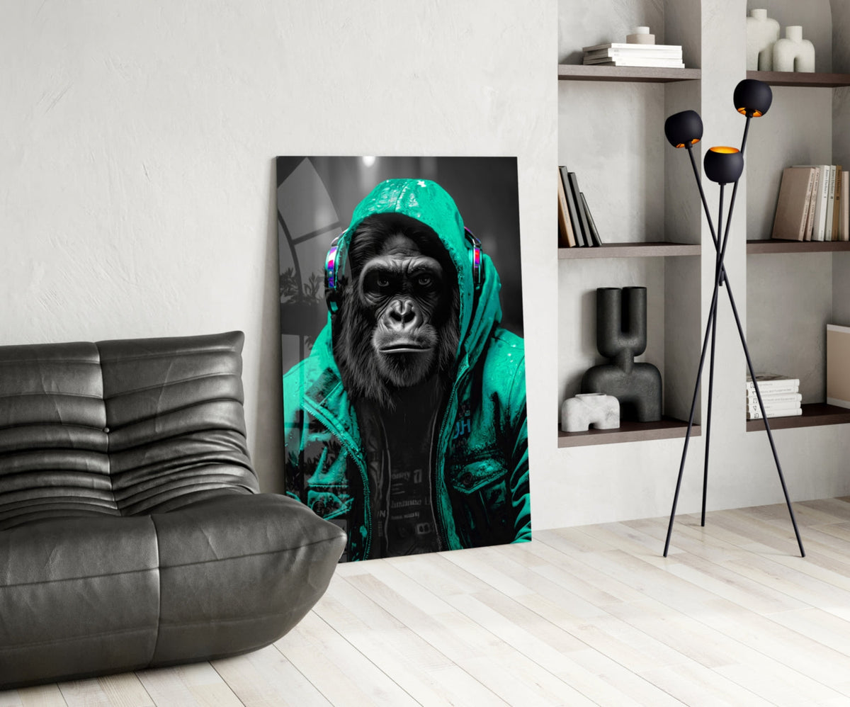 Turquoise rain hood gorilla glass wall art leaning beside a black leather lounge chair and shelves