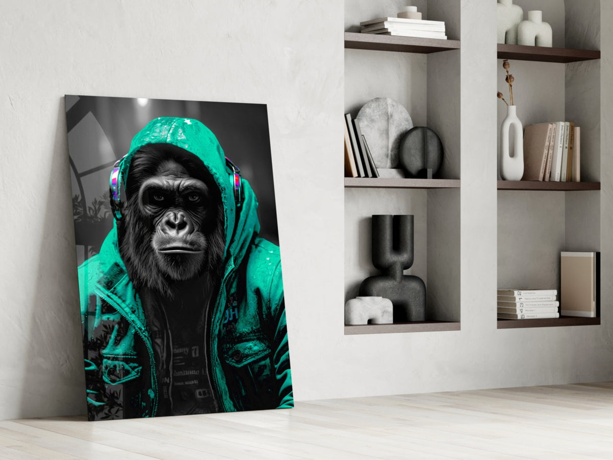 Turquoise rain hood gorilla glass wall art leaning against a wall next to shelves of vases and books