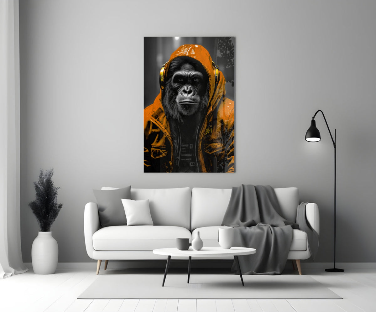 Orange rain hood gorilla glass wall art above a white sofa with a coffee table and floor lamp