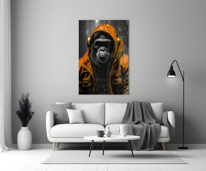 Orange rain hood gorilla glass wall art above a white sofa with a coffee table and floor lamp
