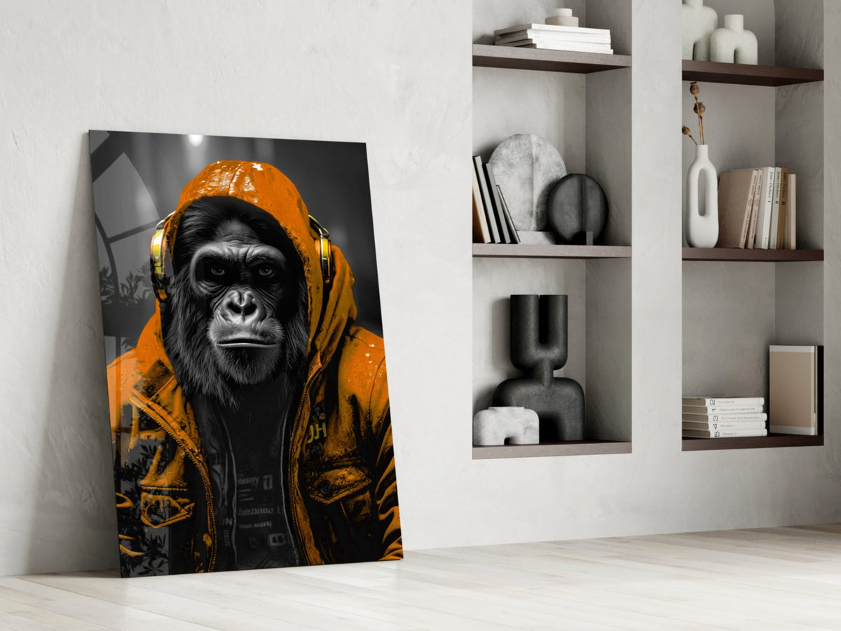 Orange rain hood gorilla glass wall art leaning against a wall next to shelves of vases and books