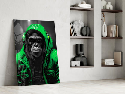 Green rain hood gorilla glass wall art leaning against a wall next to shelves of vases and books