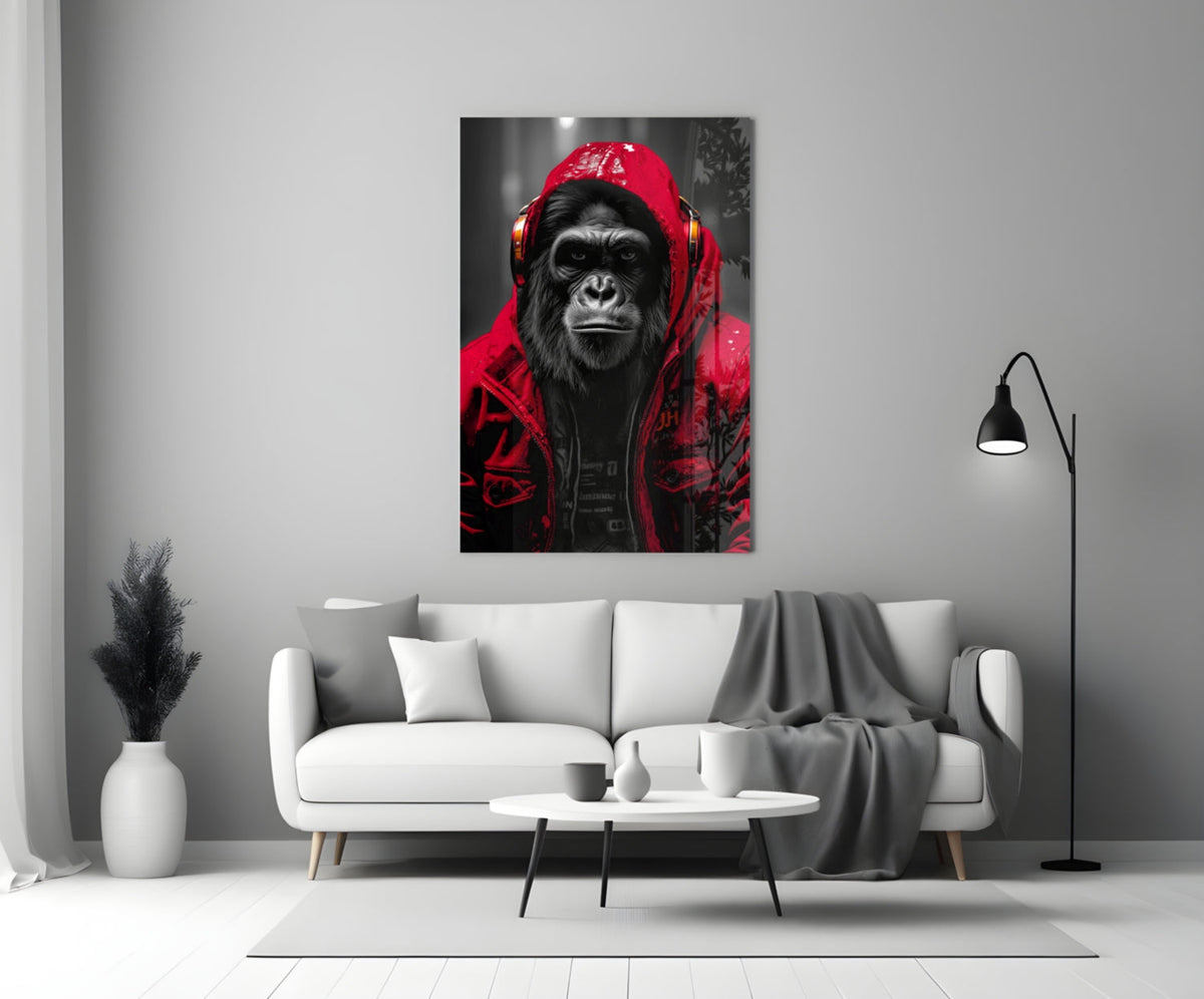 Red rain hood gorilla glass wall art above a white sofa with a coffee table and floor lamp