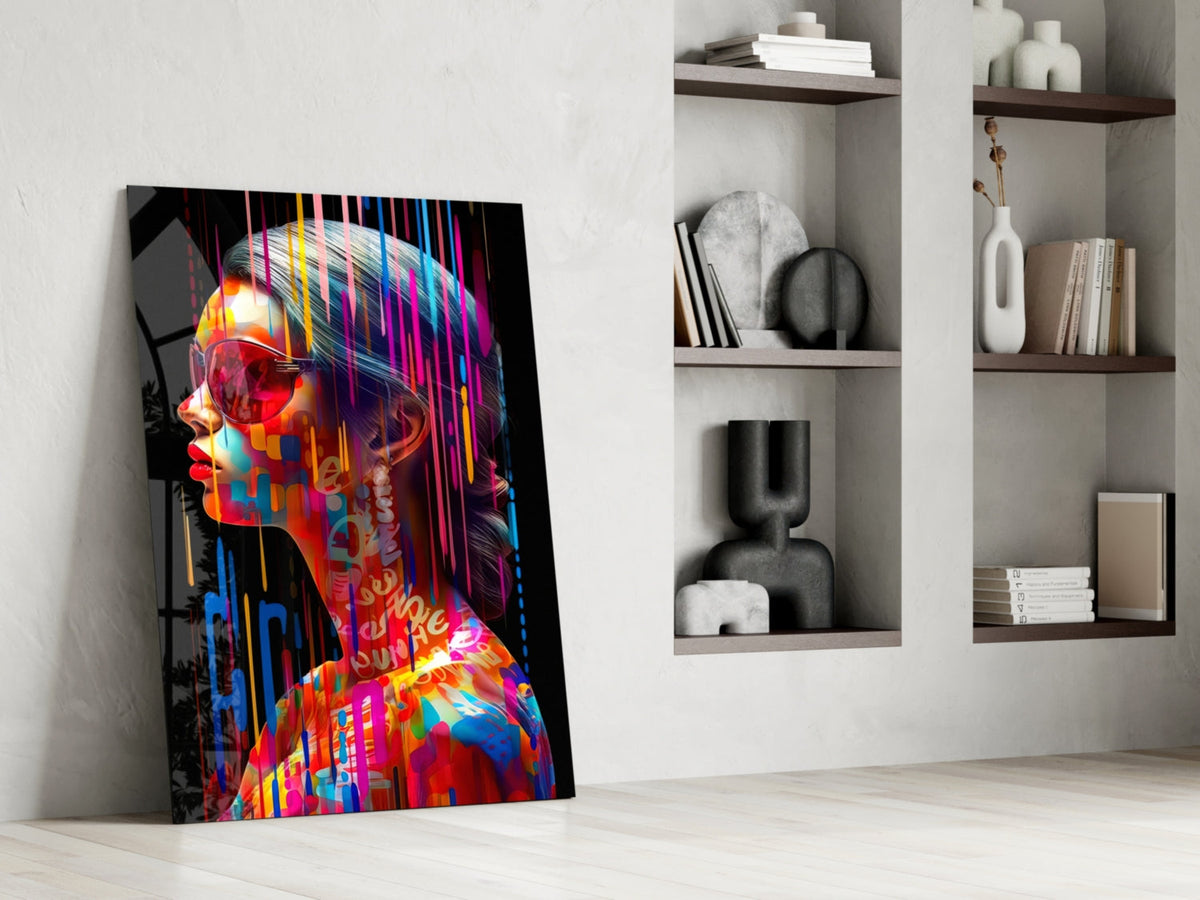 Rainbow drip woman in profile glass wall art leaning against a white wall beside built-in shelves