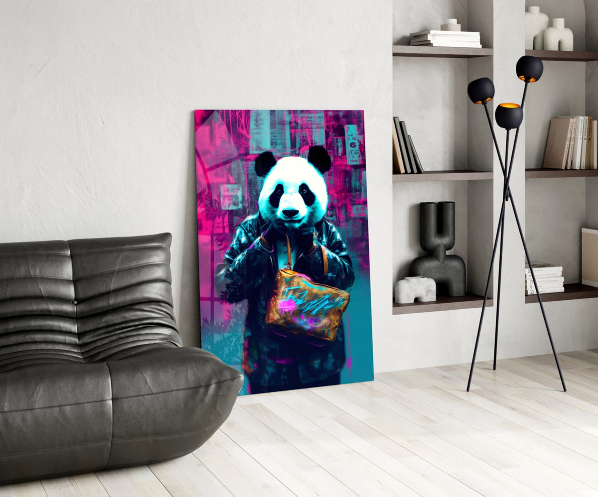 Panda in a black jacket glass wall art leaning on a white floor beside a black leather lounge chair and floor lamp