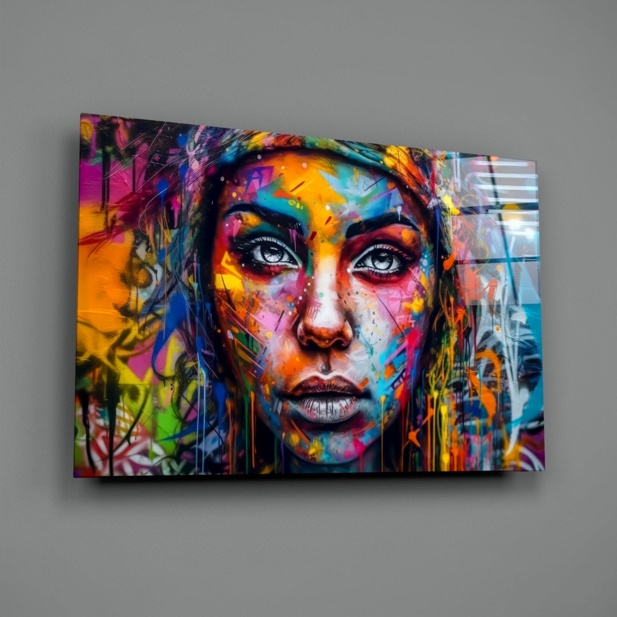 Graffiti woman portrait glass wall art hanging on a gray wall