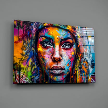 Graffiti woman portrait glass wall art hanging on a gray wall