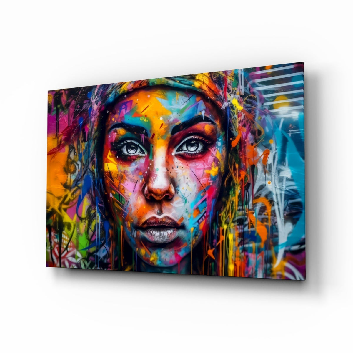 Wide eyed woman painted on a tagged street wall, glass wall art on a white background