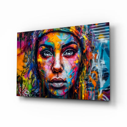 Wide eyed woman painted on a tagged street wall, glass wall art on a white background