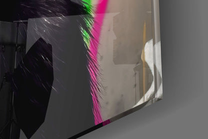 Thinking chimpanzee with headphones glass wall art edge close-up showing the glossy tempered glass surface