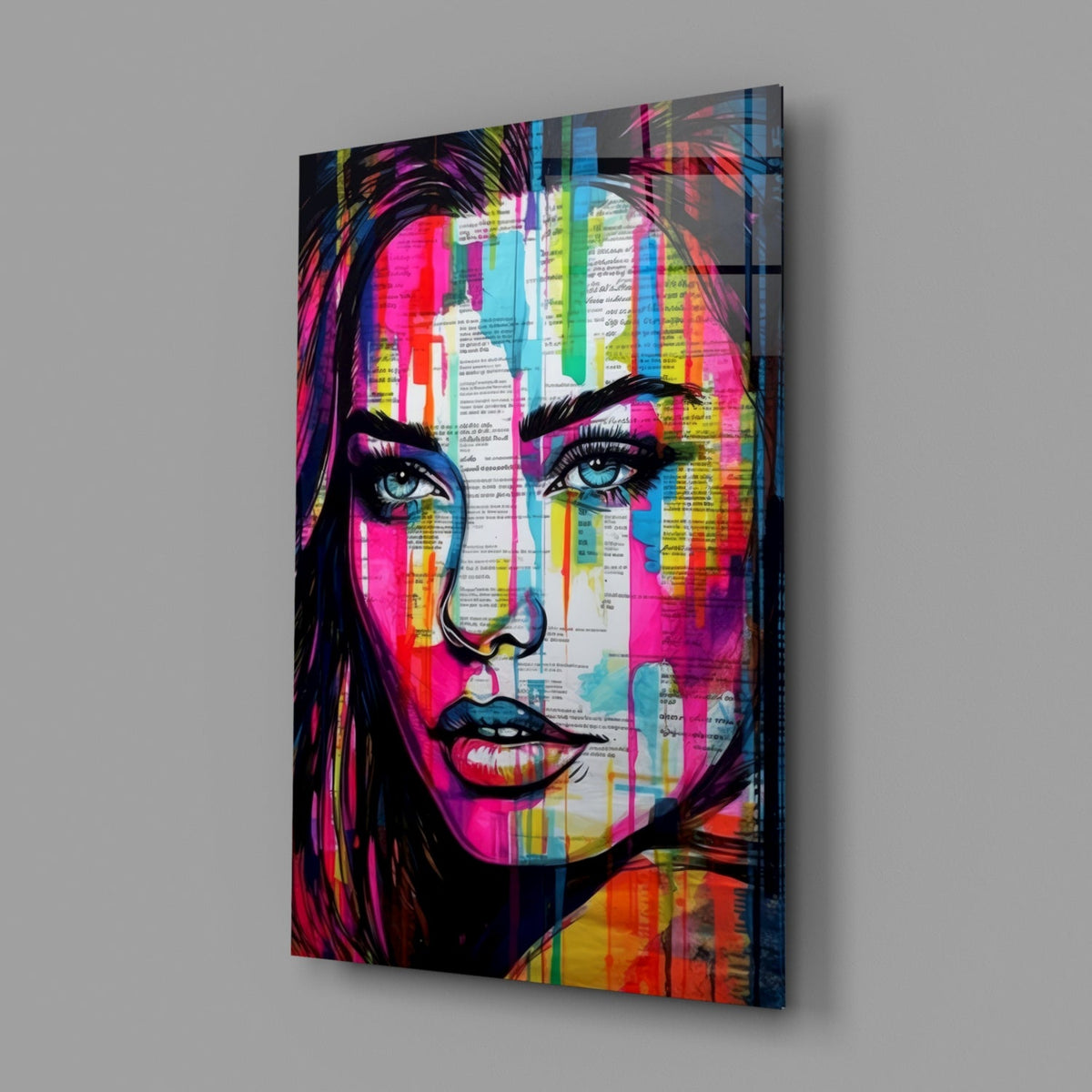 Newsprint drip woman glass wall art on a plain gray wall