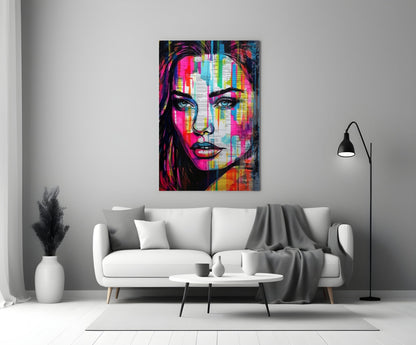 Newsprint drip woman glass wall art above a white sofa in a gray living room with a black floor lamp