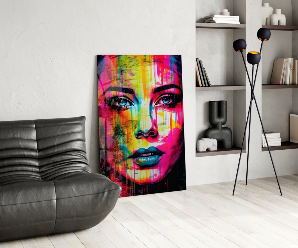 Neon drip portrait woman glass wall art leaning by a black leather lounge chair and white shelves
