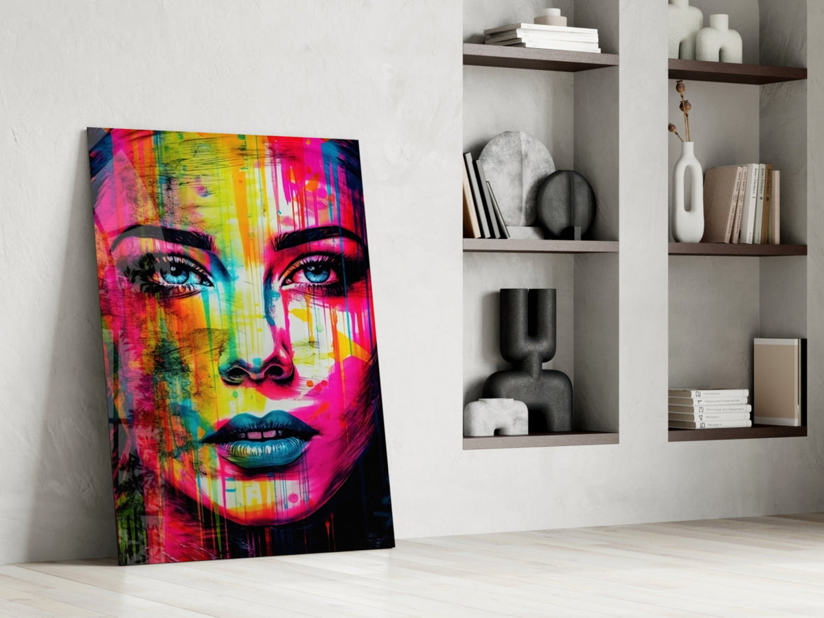 Neon drip portrait woman glass wall art leaning on the floor beside open shelves with vases