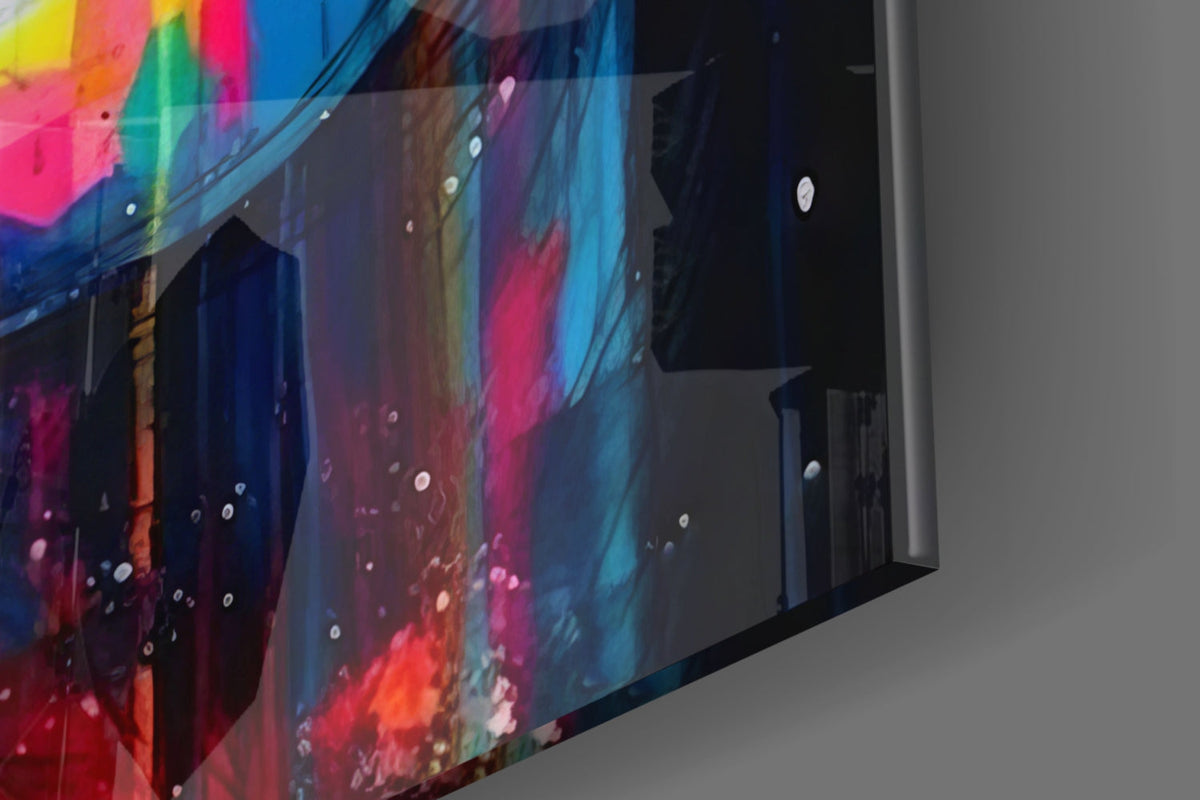 Close-up of the glossy tempered glass edge of the rainbow paint drip woman face piece