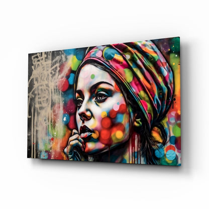 Woman in a polka dot turban glass wall art angled on a white background