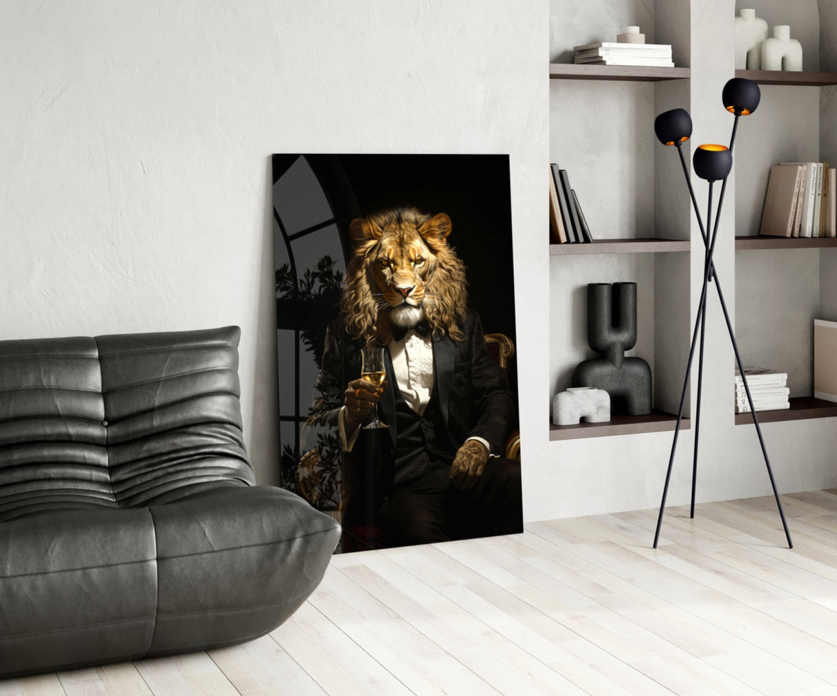 Tuxedo lion glass wall art leaning on a white wall beside a black leather lounge chair and shelves