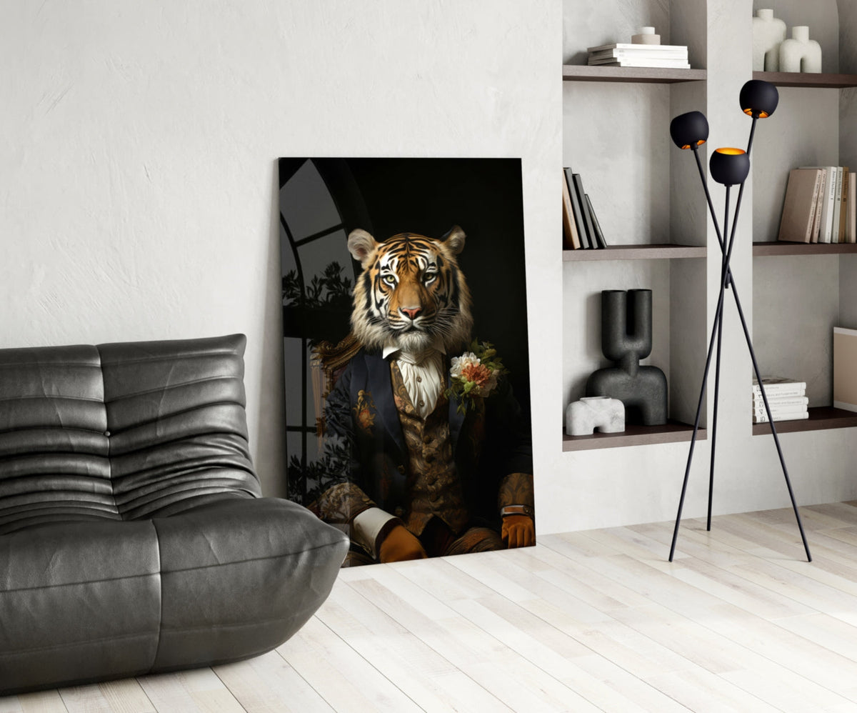 Tiger gentleman with a boutonniere glass wall art leaning on a white floor beside a black leather lounge chair and floor lamp
