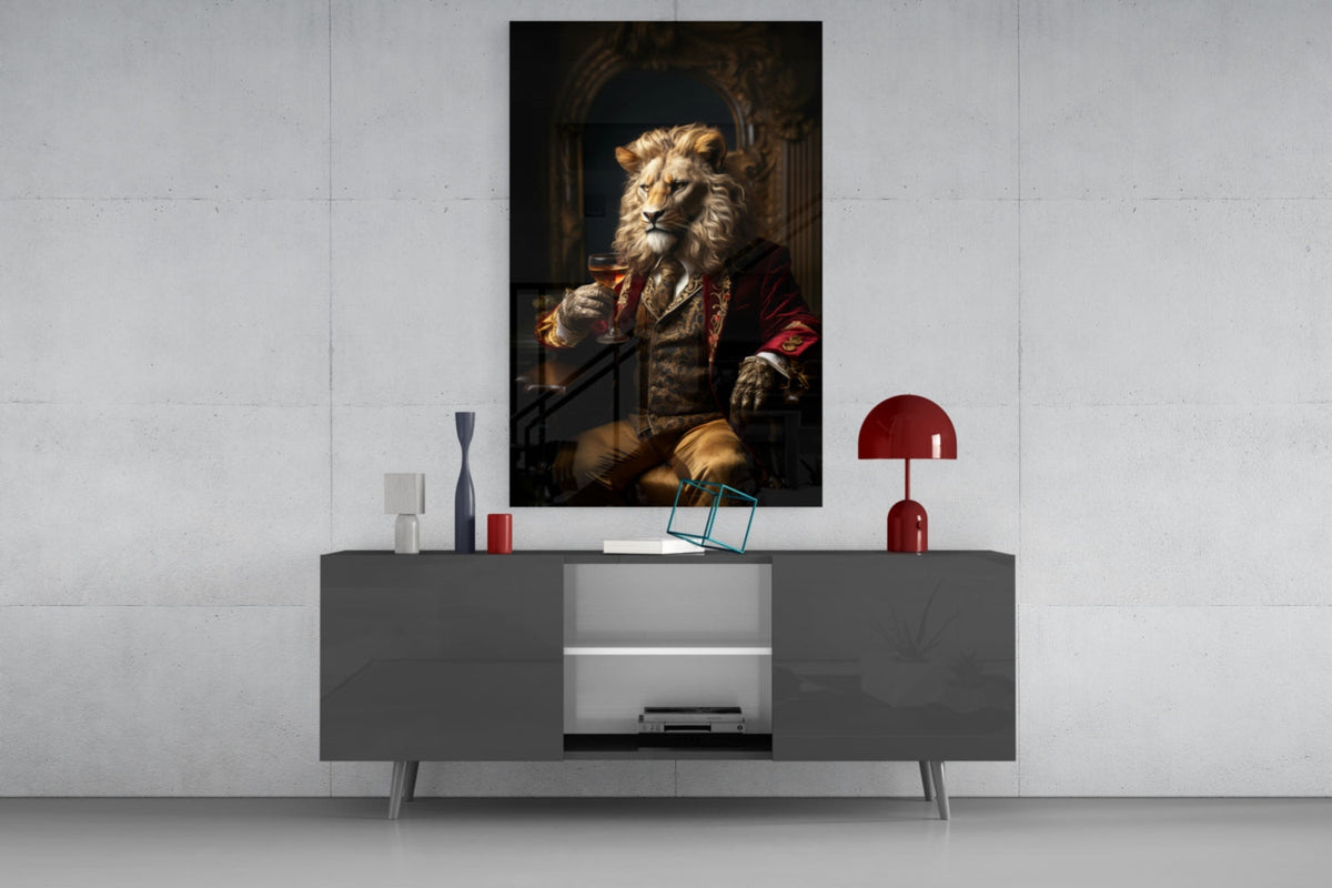 Lion gentleman in a red coat glass wall art above a gray sideboard with a red table lamp
