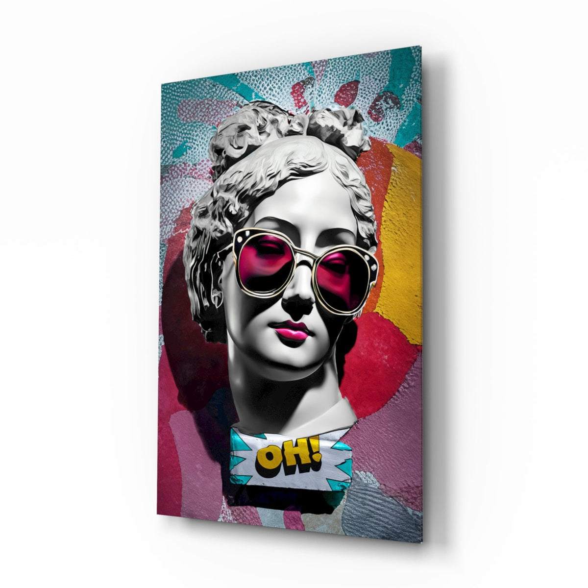 Marble bust in pink sunglasses on teal collage glass wall art shown at an angle on a white background
