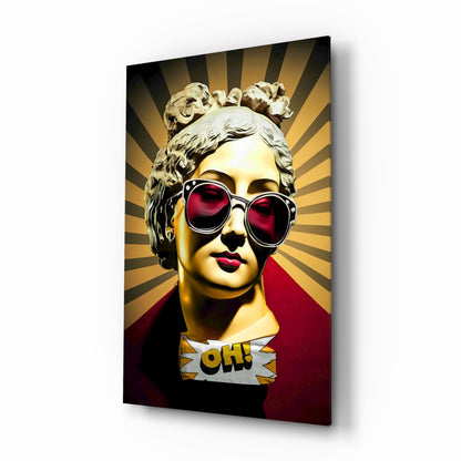 Gold bust in sunglasses on sunburst rays glass wall art shown at an angle on a white background