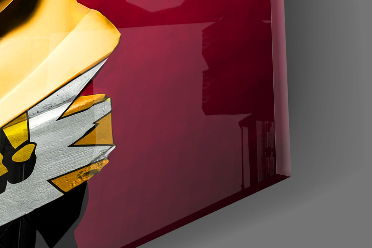 Close-up of the glossy tempered glass edge on the gold bust in sunglasses on sunburst rays print